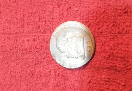 ¿Una moneda de un peso con valor de 95 mil?