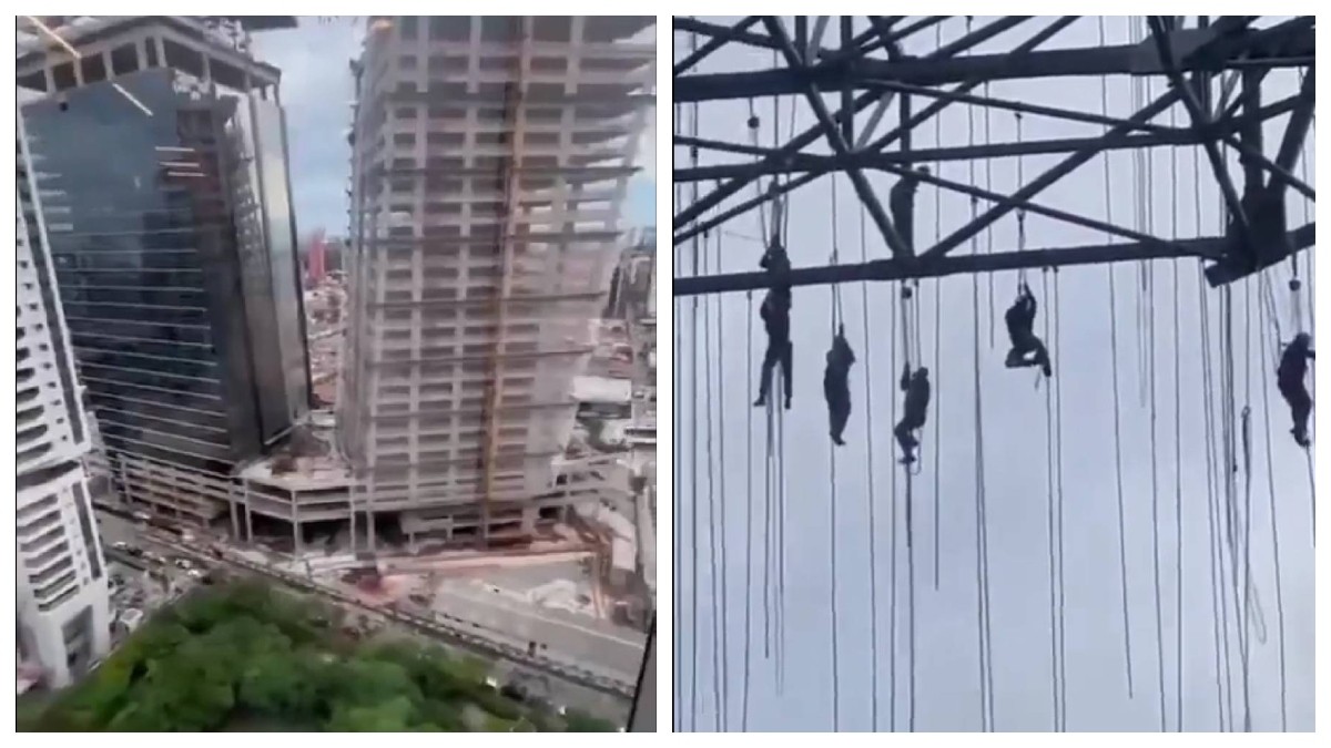 VIDEO Trabajadores quedan colgados en construcción a más de 100 metros de altura