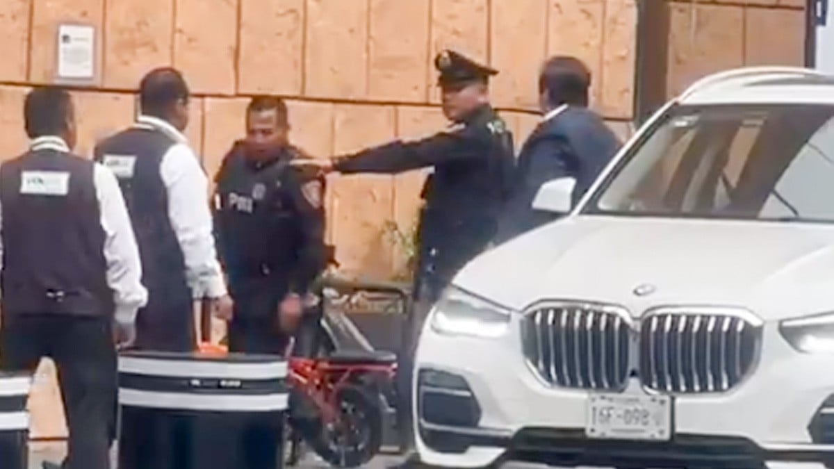 VIDEO ¡Round 1! Captan pelea entre policía y escolta privado