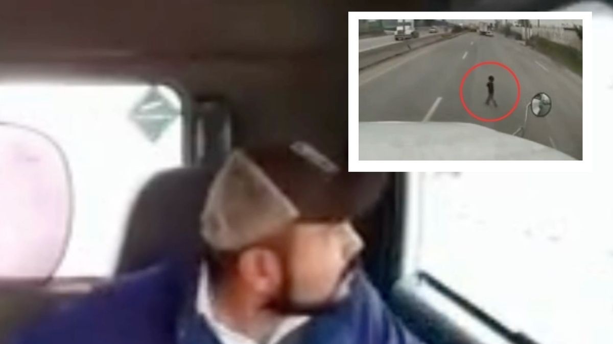 VIDEO Trailero salva la vida de niño de año y medio que se atravesó solo por la carretera