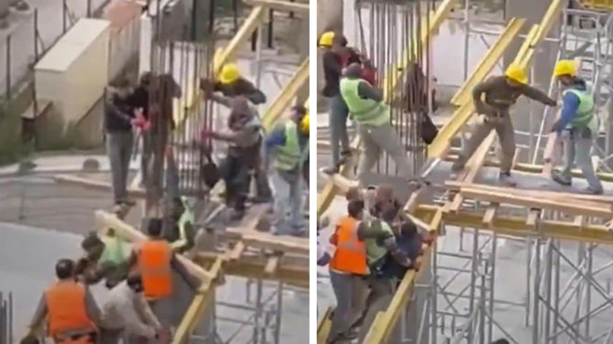 VIDEO ¡Entre tablas y varillas! Albañiles pelean en lo alto de edificio en construcción