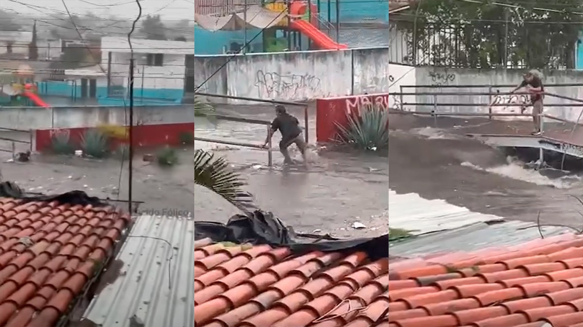 VIDEO Mujer grababa fuerte inundación cuando de repente sale un hombre del agua