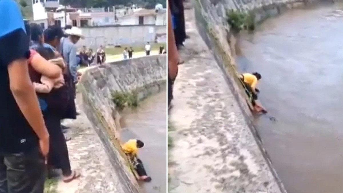 VIDEO Mujer salva y saca ella misma a su hijo ebrio que había caído a un río