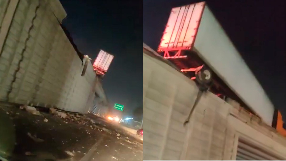 VIDEO Se accidenta tráiler y queda colgando de puente vehicular