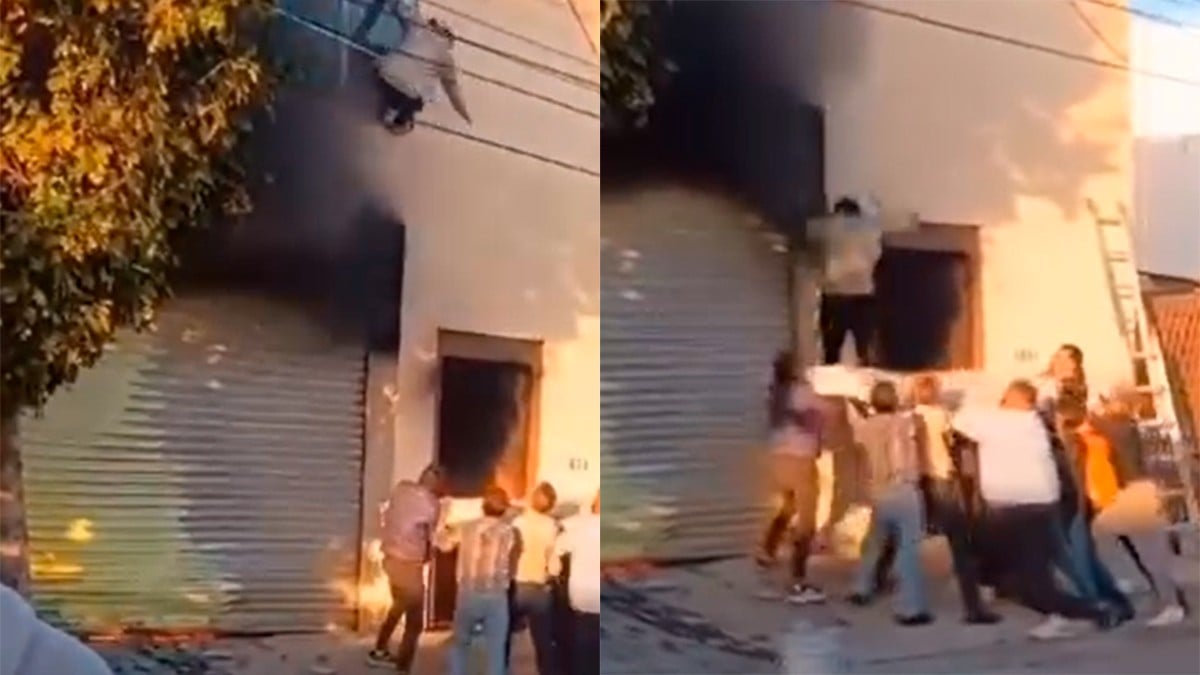 VIDEO Abuelita y su nieto son rescatados de una casa en llamas por sus vecinos