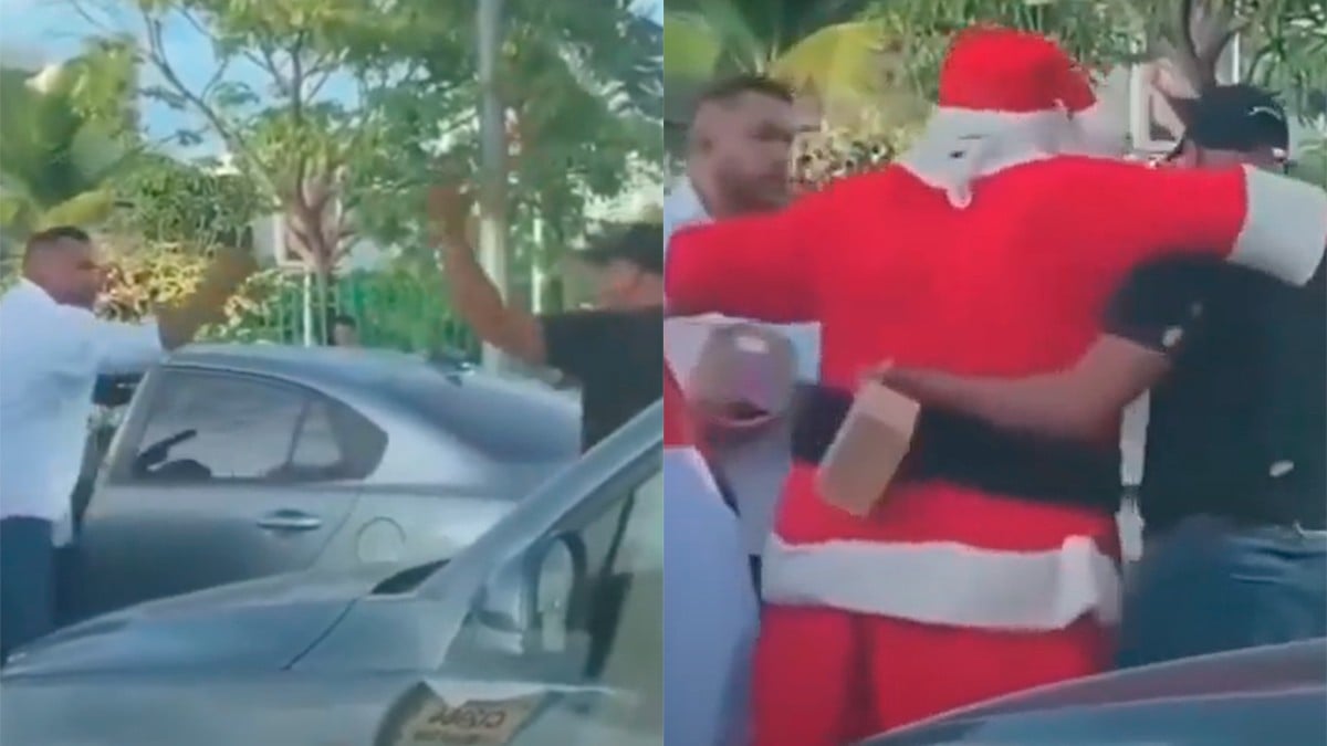 VIDEO Pelea en medio del tráfico es detenida por Santa Claus y se vuelve viral