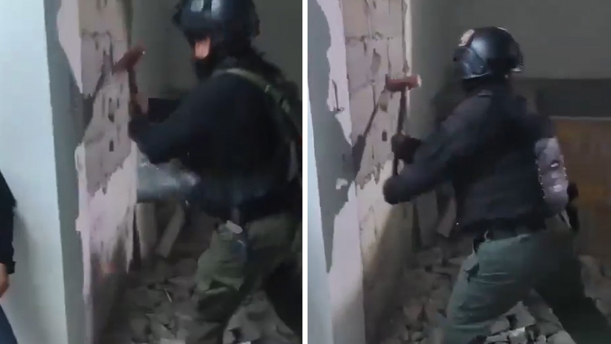 VIDEO Policías rompen ladrillos para rescatar a joven al que encerraron en una pared