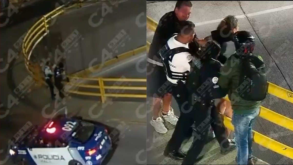 Policía rescata a mujer que estuvo en peligro de caer de un puente en el Malecón del Río