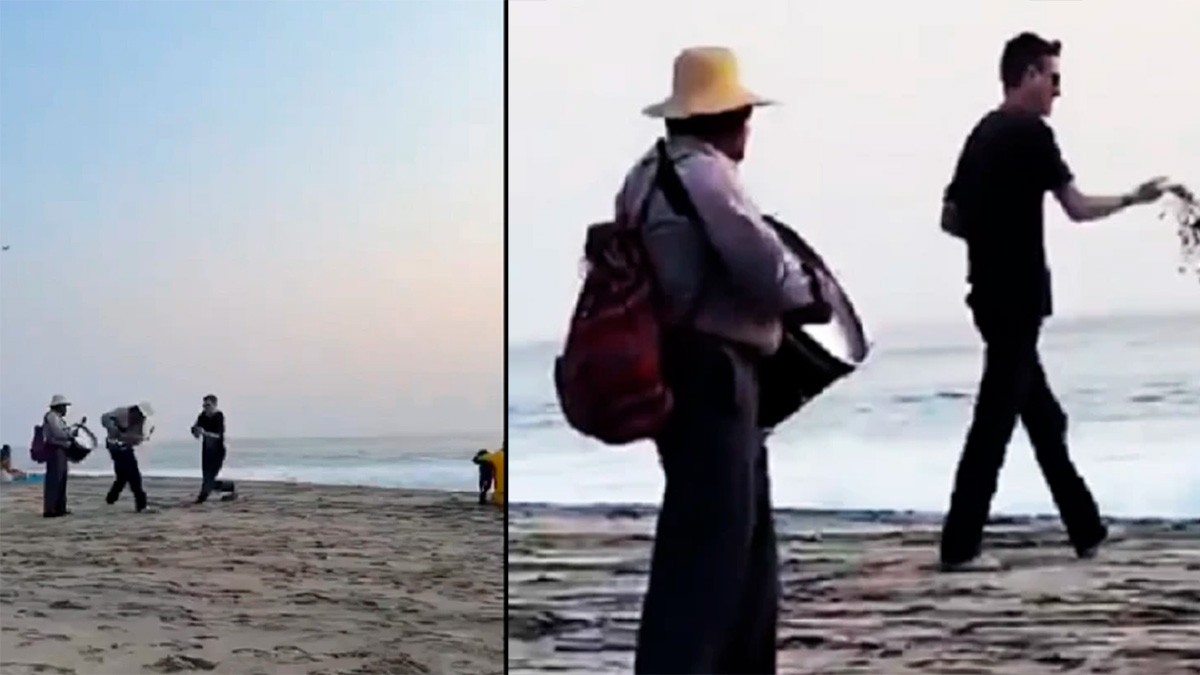 VIDEO Captan a turista agrediendo e intentando correr a músicos en una playa de Oaxaca