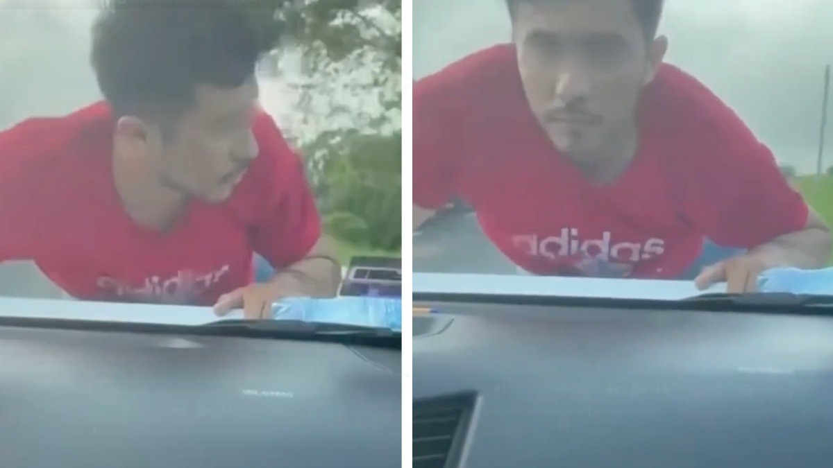 VIDEO Graban a presunto ladrón que iba colgado del cofre de un auto en plena autopista