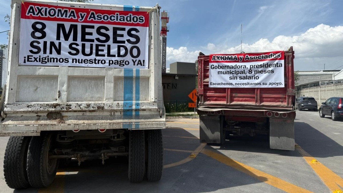¡Les deben casi 1 millón de pesos! Trabajadores de AXIOMA reclaman adeudo salarial