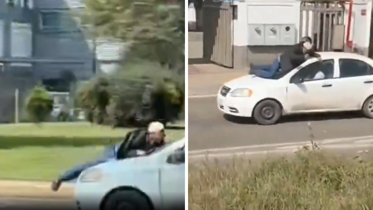 VIDEO ¡Se lo llevó colgando! Mujer acelera con un hombre sobre su cofre en la carretera