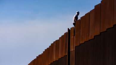 Migrante Muro fronterizo